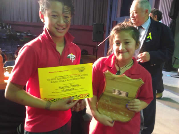 Kaea for Hokitika Primary Kapa Haka , Henare Mason and Aleigha Ngaamo with one of Hokitika’s trophies.
