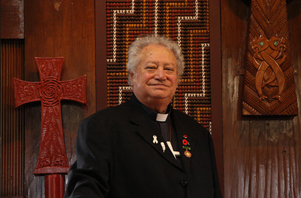 The Venerable Richard Wallace stands at the altar in the chapel of Te Waipounamu Diocesan Centre in Ōtautahi.